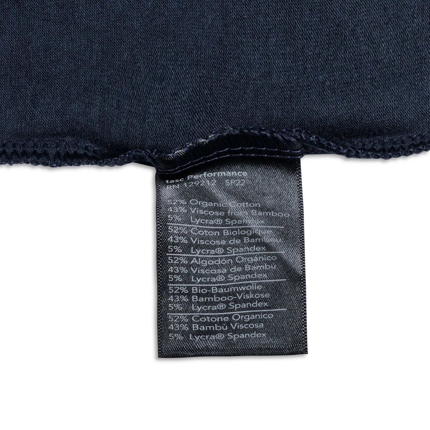 Detail of men's t-shirt materials on tag
