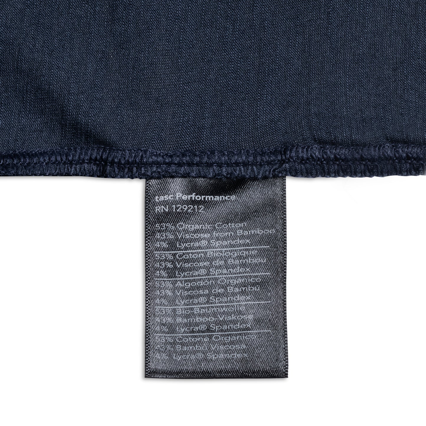 Closeup of tag displaying materials for women's dark blue shirt