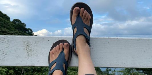 woman wearing summer footwear