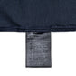 Closeup of tag displaying materials for women's dark blue shirt